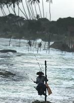 SRI LANKA-GALLE-STILT FISHING