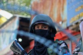 Paramilitary Soldie Women Guard During  Bike Rally