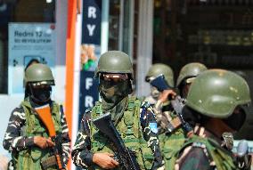 Paramilitary Soldie Women Guard During  Bike Rally