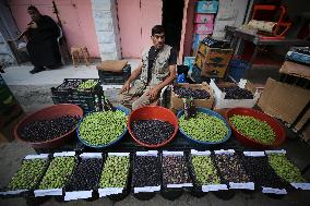 Palestinian Vendor Sells Olives