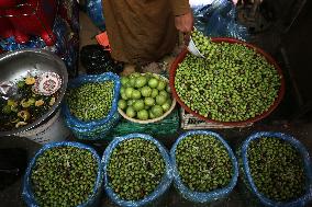 Palestinian Vendor Sells Olives