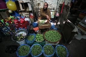 Palestinian Vendor Sells Olives