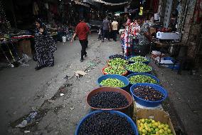 Palestinian Vendor Sells Olives