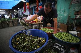 Palestinian Vendor Sells Olives