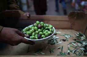 Palestinian Vendor Sells Olives