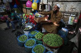 Palestinian Vendor Sells Olives