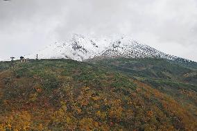 Mt. Asahi covered with season's 1st snow