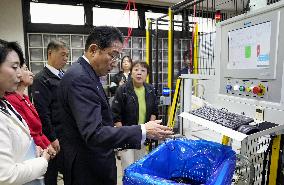 Japan PM visits small rubber product maker in Tokyo