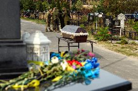 Flags On The Graves Of Ukrainian Soldiers On The Alley Of Heroes In Irpin