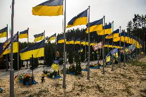 Flags On The Graves Of Ukrainian Soldiers On The Alley Of Heroes In Irpin