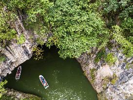 Tourist Visit Karst Cave Scene in Bijie