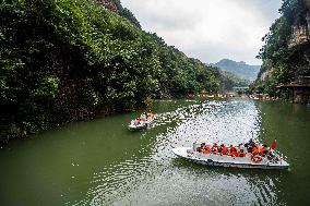 Tourist Visit Karst Cave Scene in Bijie