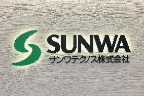 SUN-WA TECHNOS signage and logo