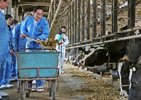 Japan PM Kishida visits dairy farm in Tochigi