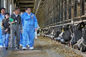 Japan PM Kishida visits dairy farm in Tochigi