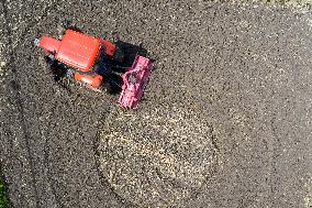 Farmers Plow Land in Congjiang