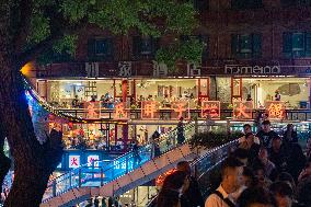 Tourists Eat at Hot Pot Restaurants in Chongqing