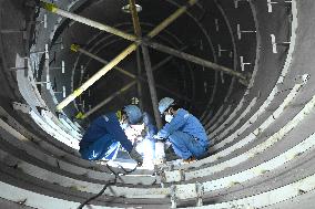 Workers Weld Steel Products in Jingjiang