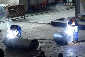 Workers Weld Steel Products in Jingjiang