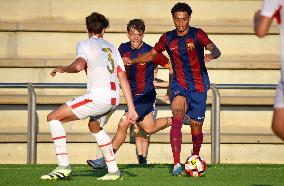 Ronaldinho Son Playing With The FC Barcelona Youth Team