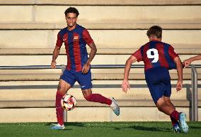 Ronaldinho Son Playing With The FC Barcelona Youth Team