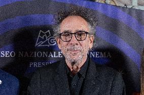 "The World Of Tim Burton" Exhibition Purple Carpet