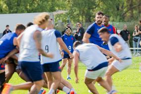 Antoine Dupont using a head guard during a training session - Paris