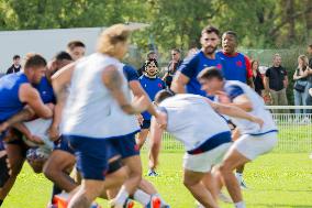 Antoine Dupont using a head guard during a training session - Paris