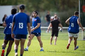 Antoine Dupont using a head guard during a training session - Paris