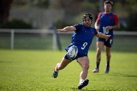 Antoine Dupont using a head guard during a training session - Paris