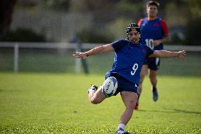 Antoine Dupont using a head guard during a training session - Paris