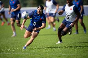 Antoine Dupont using a head guard during a training session - Paris