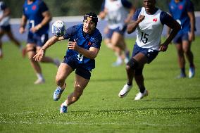 Antoine Dupont using a head guard during a training session - Paris