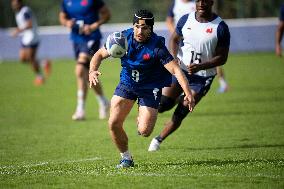 Antoine Dupont using a head guard during a training session - Paris