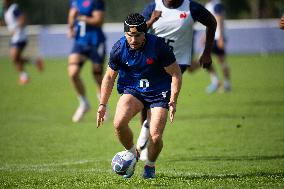 Antoine Dupont using a head guard during a training session - Paris