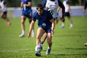 Antoine Dupont using a head guard during a training session - Paris