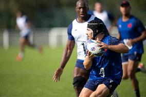 Antoine Dupont using a head guard during a training session - Paris