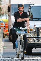 Hugh Jackman Riding A Bike - NYC
