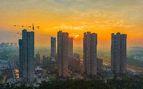 Buildings Under Construction Under The Rising Sun