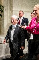 Interim House Speaker Patrick McHenry (R-NC) talks with reporters as he leaves a House Republican meeting to choose a House Spea