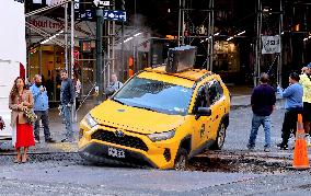 Taxi Stuck In Hole - NYC