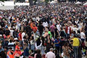 Persons Observe Annular Solar Eclipse From Mexico