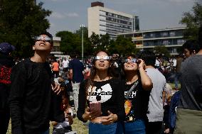 Persons Observe Annular Solar Eclipse From Mexico