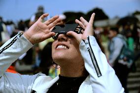 Persons Observe Annular Solar Eclipse From Mexico