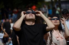 Persons Observe Annular Solar Eclipse From Mexico