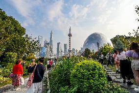Tourists Visit The North Bund Scenic Area in Shanghai