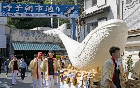 Festival with whale-shaped float in Saga