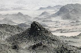 An Elliptical Crater Basin in The Gobi in Hami