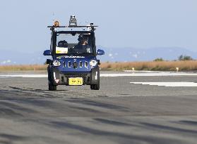 Electric car test on airport runway
