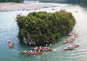 Traditional boat race near western Japan shrine